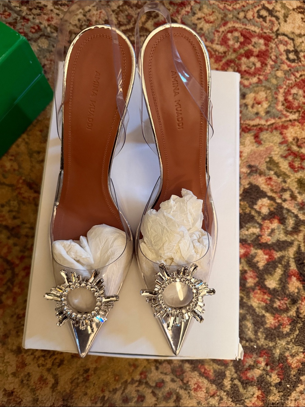 Amina Muaddi Clear Slingback Pumps with Silver Sunburst Embellishments